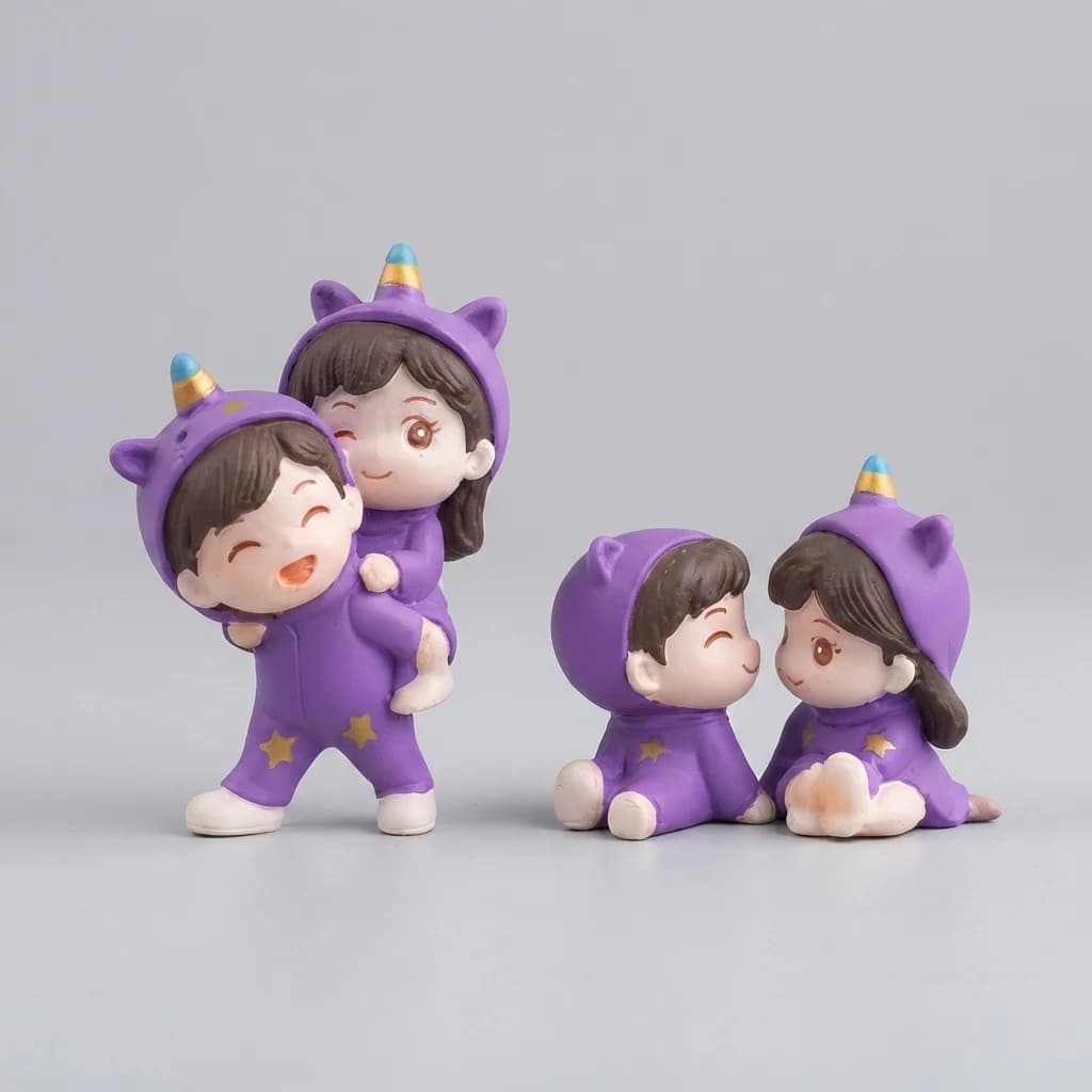 Two purple couple miniatures wearing unicorn hoods standing on a plain grey surface.